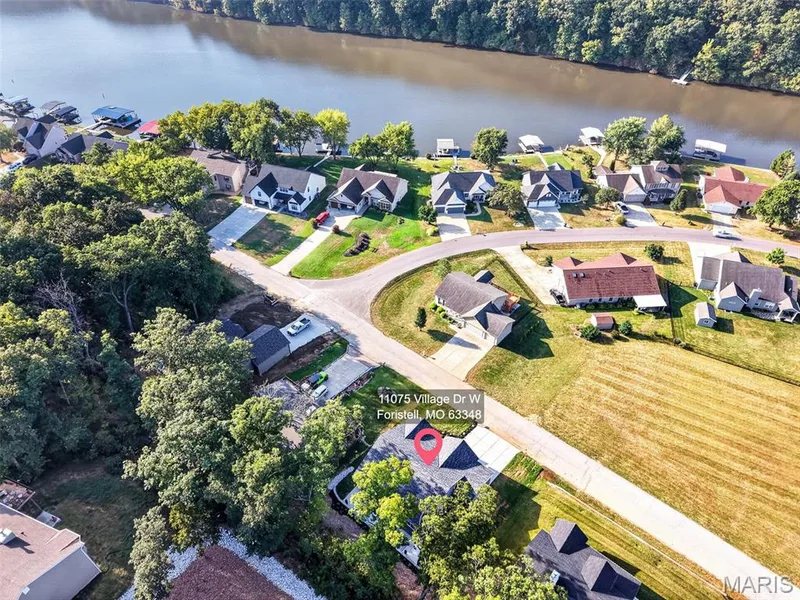 Aerial perspective highlighting the home’s desirable proximity to Incline Village’s main lake. — 11075 Village Drive, Foristell, MO 63348