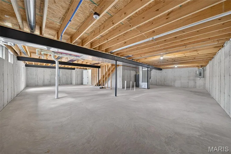 The unfinished lower level offers an exceptional footprint for future living space. — 11075 Village Drive, Foristell, MO 63348