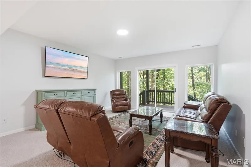 Spacious Lower Level w/deck overlooking private backyard & acreage. — 3311 Pine Cliff Road, Wildwood, MO 63038