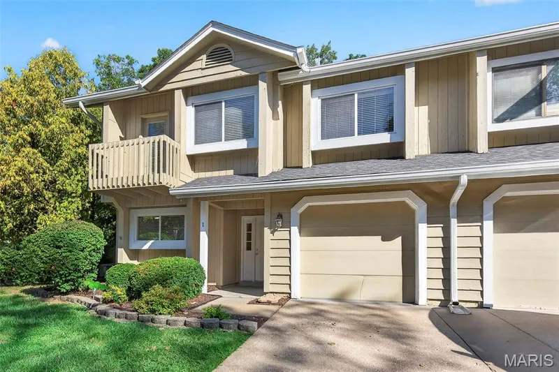 Shared driveway leading into your private garage — 1 Rue De Paix #6, Lake St. Louis, MO 63367