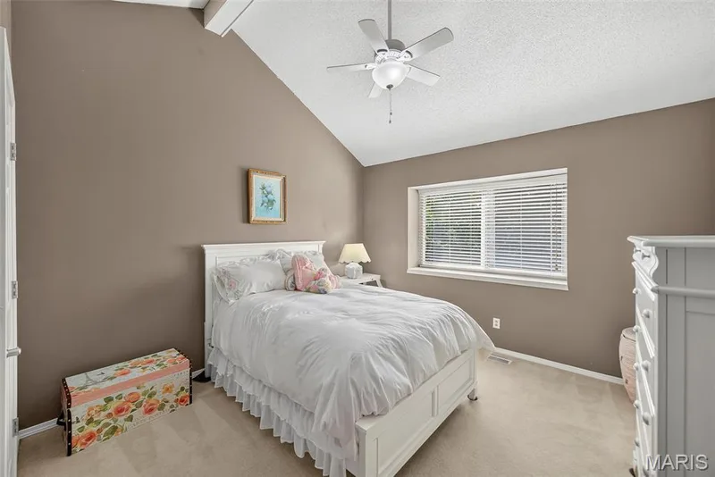 Bedroom with window shelf and cieling fan — 1 Rue De Paix #6, Lake St. Louis, MO 63367