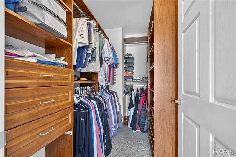 Custom closet in primary bedroom — 6 Monarch Trace Court #304, Chesterfield, MO 63017
