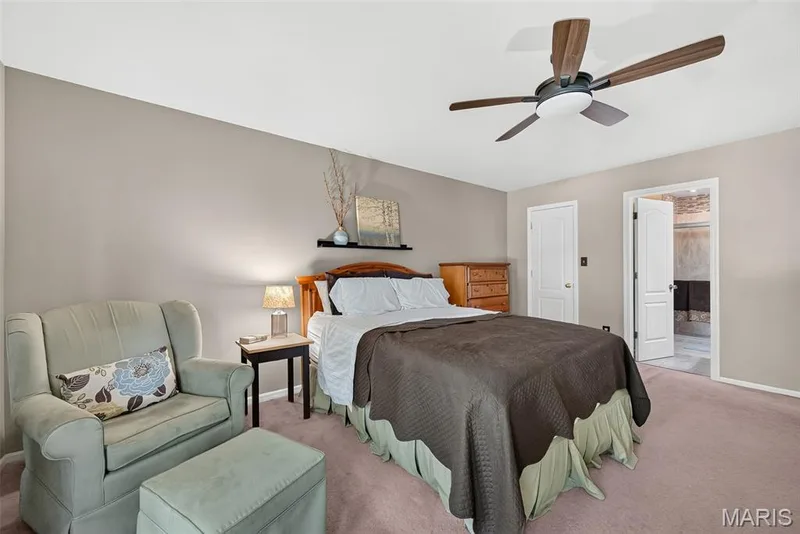 Recessed lighting, ceiling fan with integrated light, and a built-in wall shelf — 10 Docs Ct., St Charles, MO 63303