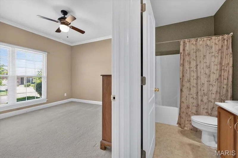 Bedroom #2 front of the villa with large windows. — 2418 Golden Bear Way #711A, Wentzville, MO 63385