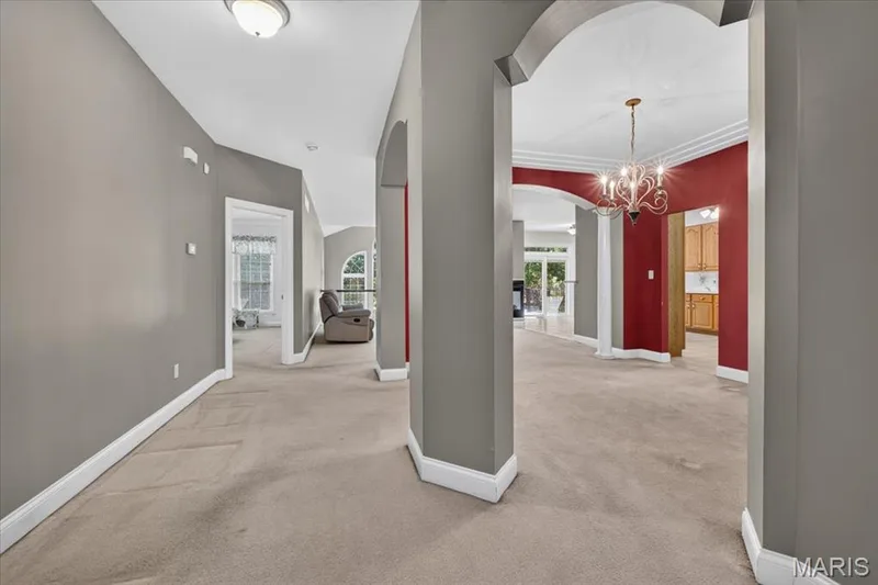 Living room and separate dining room — 2418 Golden Bear Way #711A, Wentzville, MO 63385