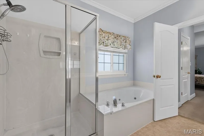 Primary bathroom with jetted tub and separate shower — 2418 Golden Bear Way #711A, Wentzville, MO 63385