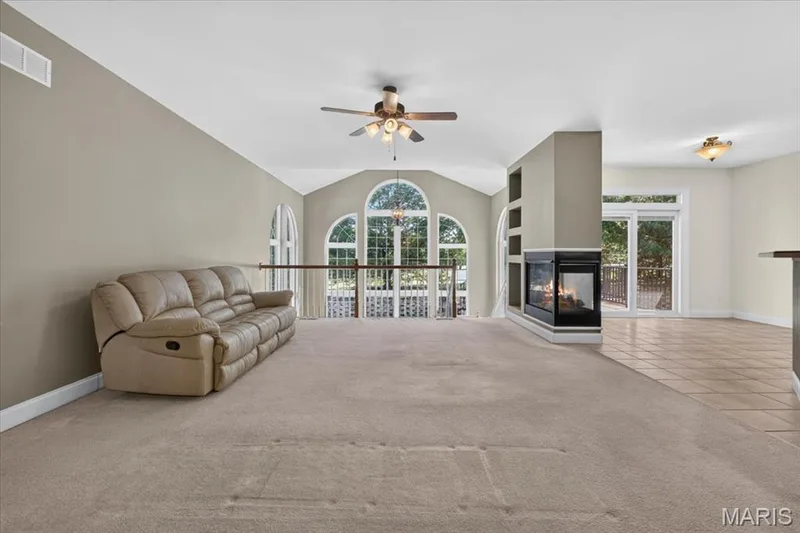 Great room with beautiful newer windows and natural light — 2418 Golden Bear Way #711A, Wentzville, MO 63385