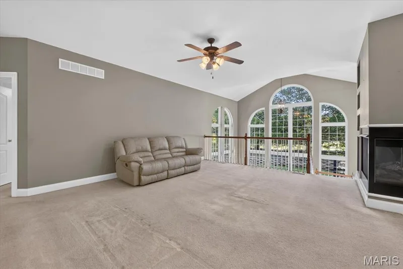 Large living room with tons of windows — 2418 Golden Bear Way #711A, Wentzville, MO 63385
