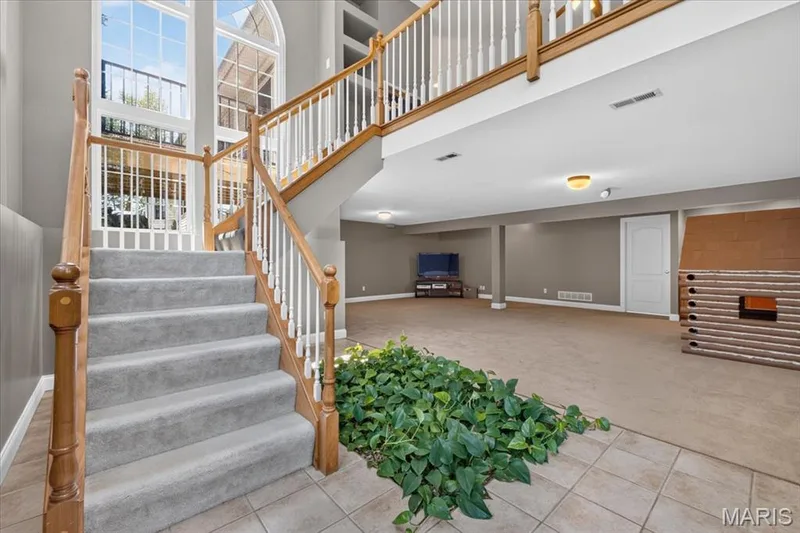 Staircase to lower level — 2418 Golden Bear Way #711A, Wentzville, MO 63385