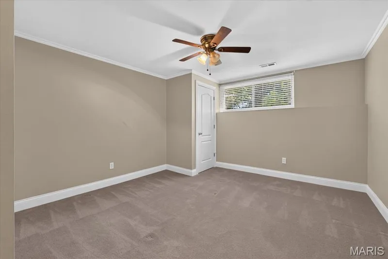 Bedroom #3 in lower level with sump pump — 2418 Golden Bear Way #711A, Wentzville, MO 63385