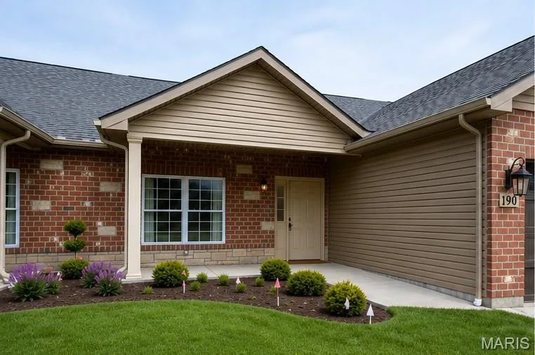 Brick and siding exterior with a covered entry — 190 Santa Elena Drive, Wentzville, MO 63385