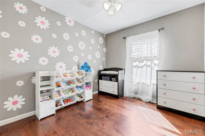 Bright, calm, and wonderfully open—the generous layout makes this versatile space feel effortlessly spacious and inviting, whether as a nursery, spare bedroom, or home office. — 601 Big Timber Lane, O'Fallon, MO 63368
