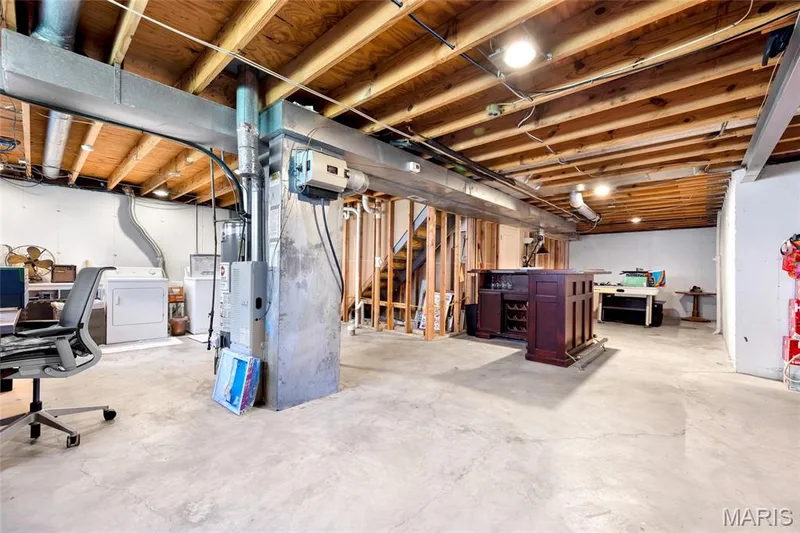 Unfinished side of basement.  Seller is happy to leave this bar for future finishing — 601 Big Timber Lane, O'Fallon, MO 63368
