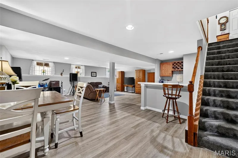 Large family room in the lower level — 2417 S Lakeridge Court #14, Lake St. Louis, MO 63367