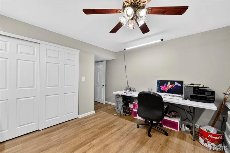 Bedroom in Lower Level - currently used as a craft room  Yes, there is proper egress! — 2417 S Lakeridge Court #14, Lake St. Louis, MO 63367