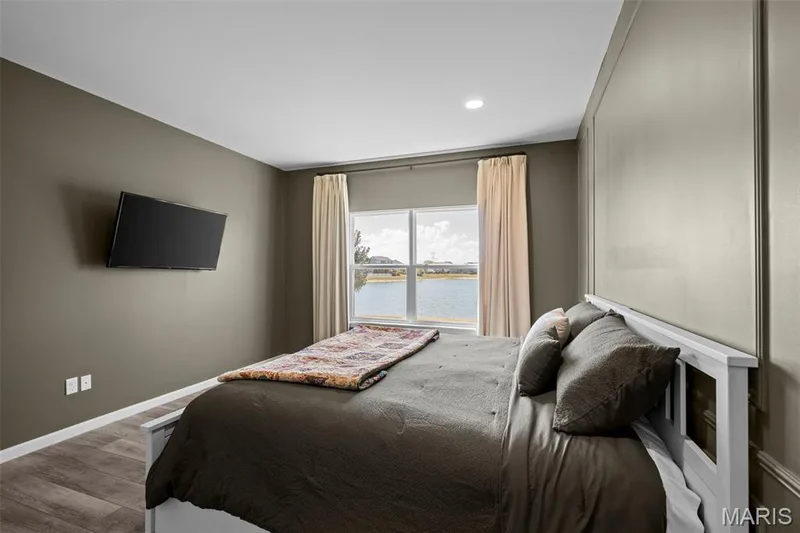Primary enjoys the serene water view! — 213 Charlestowne Place Drive, St Charles, MO 63301