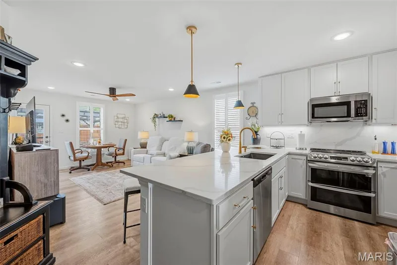Open concept between kitchen & living room! — 3404 Reed Crossing Street, St Charles, MO 63301