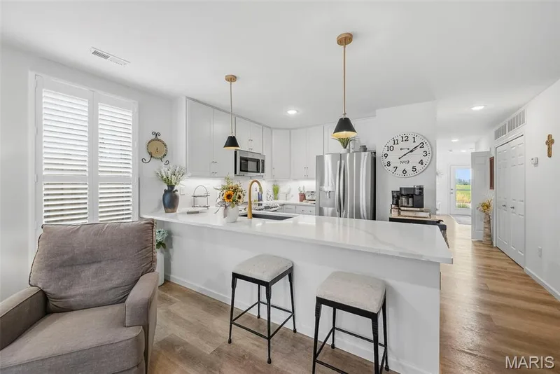 Breakfast bar seating! — 3404 Reed Crossing Street, St Charles, MO 63301