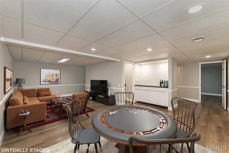 Virtual staging with some of the possibilities...movie nights and game nights — 2477 Baxton Way, Chesterfield, MO 63017