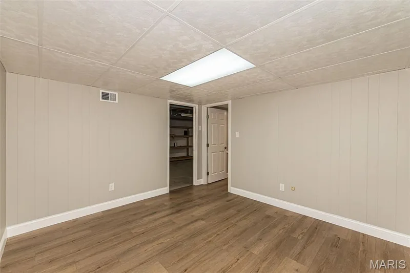 Flex space in the LL can be an office/gym or sleeping area — 2477 Baxton Way, Chesterfield, MO 63017