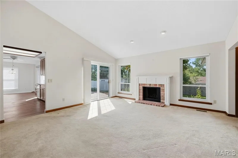 Great Room with Vaulted Ceilings and Wood Burning Fireplace — 3044 Brentmoor Drive, St Charles, MO 63303