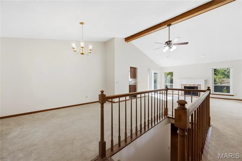 Dining Area and Great Room with Wood Beamed Vaulted Ceiling — 3044 Brentmoor Drive, St Charles, MO 63303