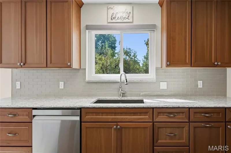 Updated Kitchen with Window over sink looking out to Backyard — 3044 Brentmoor Drive, St Charles, MO 63303
