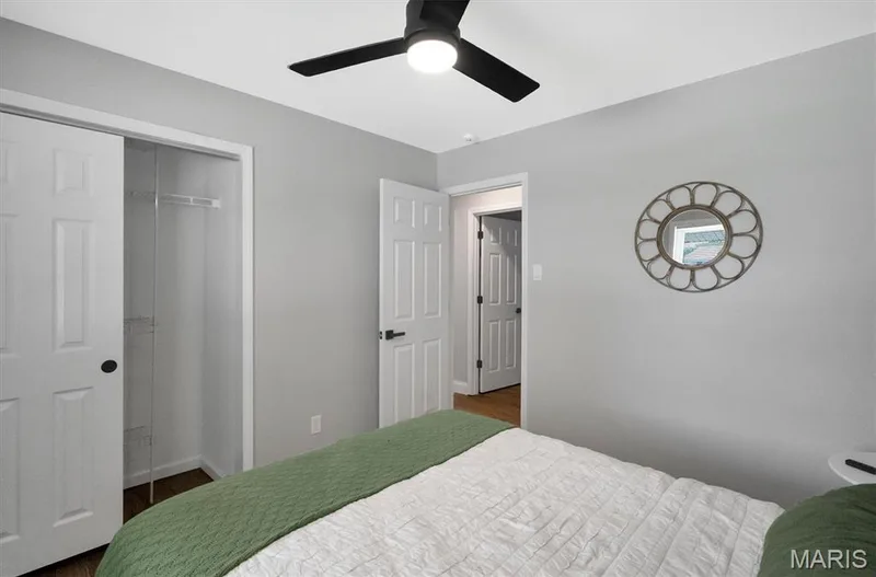 Recessed lighting with a ceiling fan, light gray wall paint, and wood-finish flooring — 7 Saint Mark Drive, St Peters, MO 63376