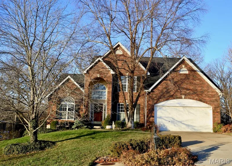 Homeowner's pictures showing front elevation without trees blocking the front — 730 Longfellow Circle, O'Fallon, MO 63366