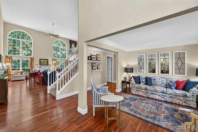 Entry foyer opens to sitting room and great room just beyond — 730 Longfellow Circle, O'Fallon, MO 63366
