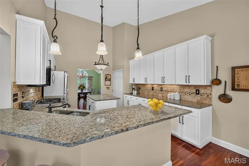 Vaulted ceilings with pendant lighting — 730 Longfellow Circle, O'Fallon, MO 63366