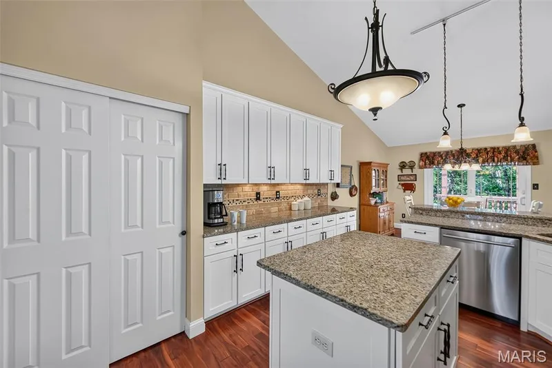 Tile backsplash and under cabinet lighting — 730 Longfellow Circle, O'Fallon, MO 63366