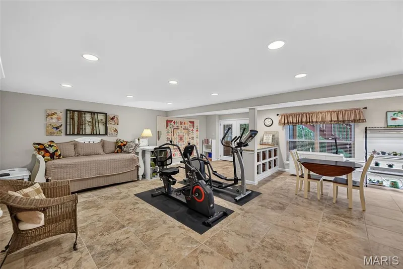 Enough room for separate zones for living, fitness, or crafting — 730 Longfellow Circle, O'Fallon, MO 63366