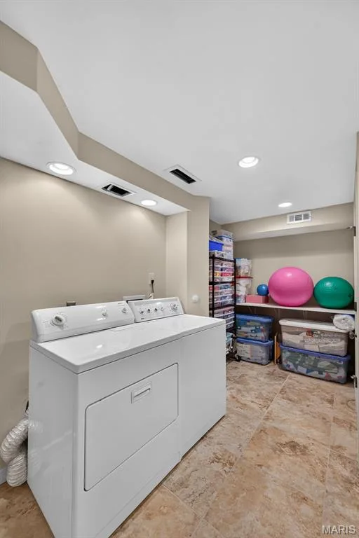 Laundry room, with washer/dryer staying, making it truly move in ready! — 730 Longfellow Circle, O'Fallon, MO 63366