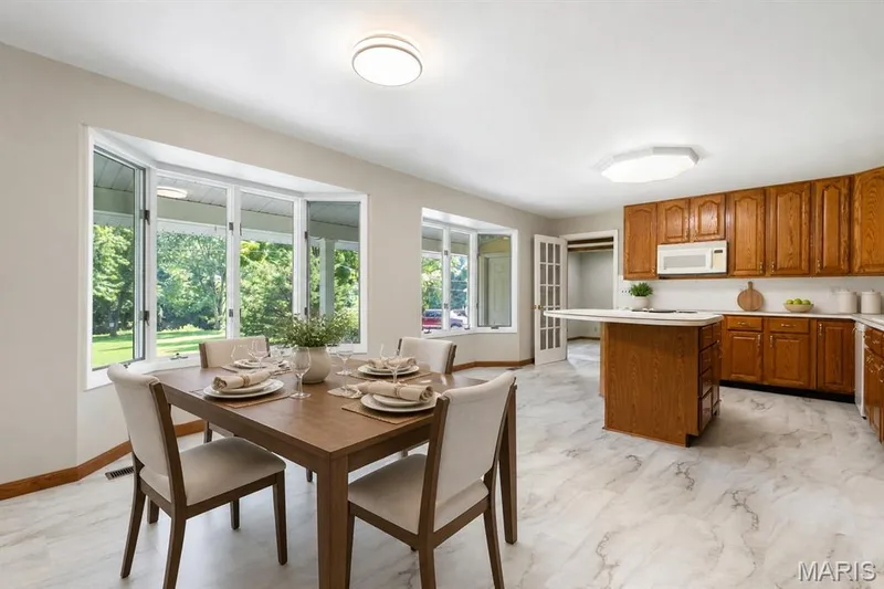 Breakfast room virtually staged — 14 Connie Drive, St Charles, MO 63301