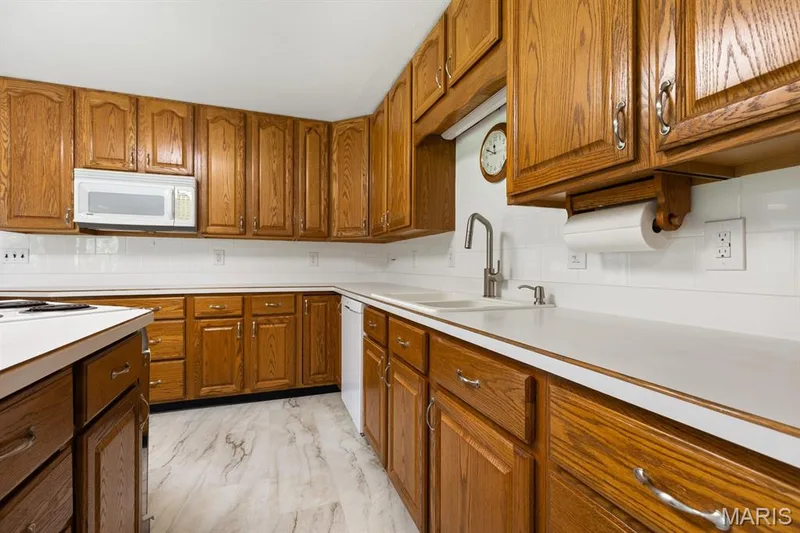 New cabinet hardware — 14 Connie Drive, St Charles, MO 63301