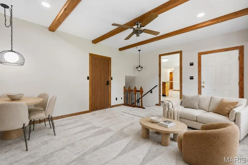 Main level family room virtually staged — 14 Connie Drive, St Charles, MO 63301