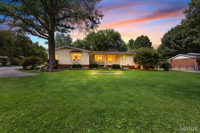 Rear view of home at dusk — 14 Connie Drive, St Charles, MO 63301