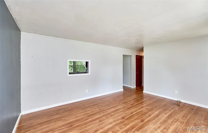 Wood-finish flooring throughout — 318 Capri Drive, O'Fallon, MO 63366