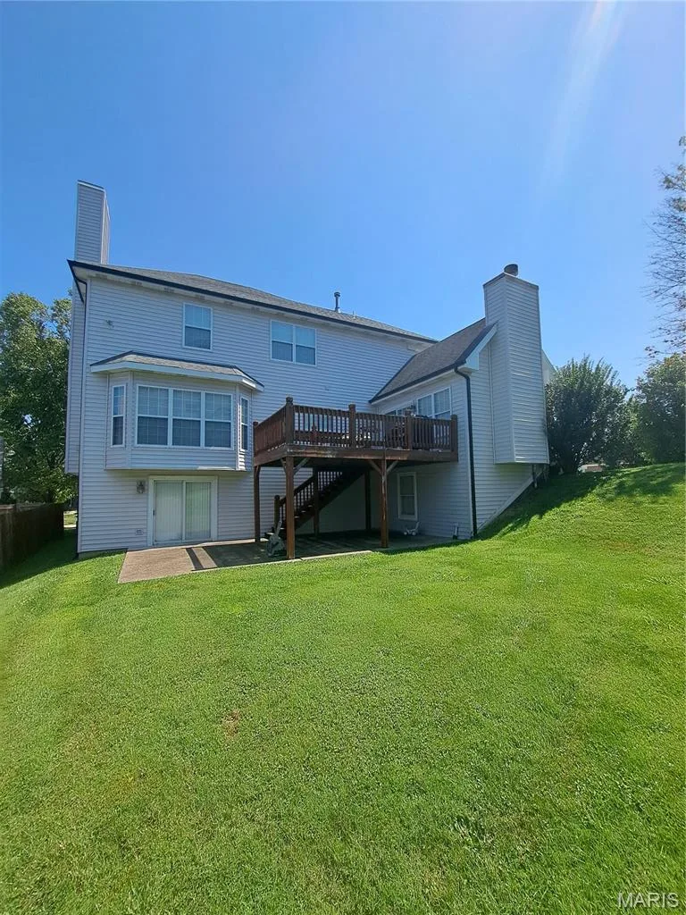 Back of the house showing walkout and deck — 14001 Eagle Manor Court, Chesterfield, MO 63017