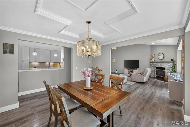 Seamless transition from the living room to the dining room — 6 Potomac Court, St Charles, MO 63303