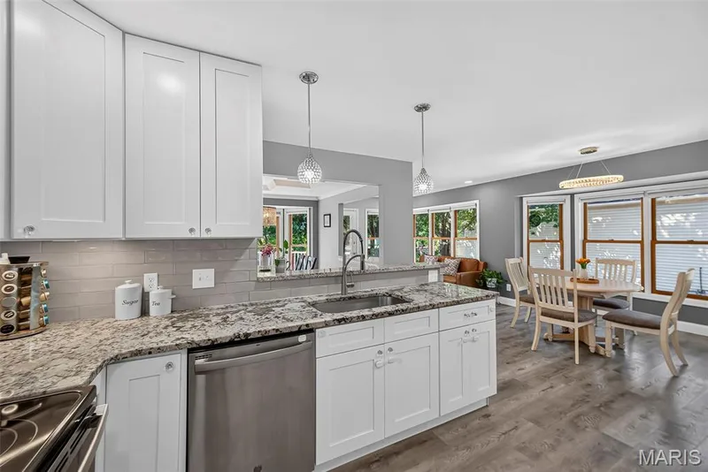 Overlook the breakfast nook and the dining room — 6 Potomac Court, St Charles, MO 63303