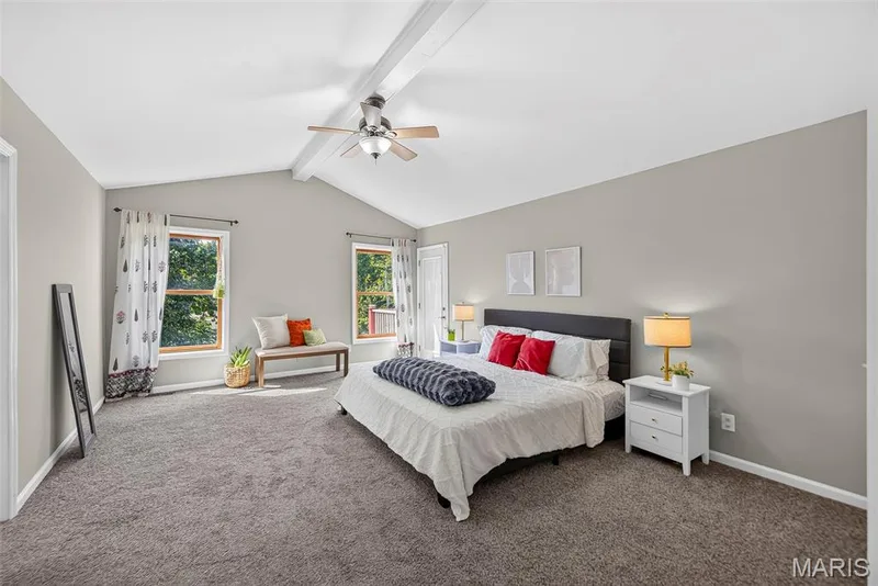Vaulted ceiling with entry to upper back deck — 6 Potomac Court, St Charles, MO 63303