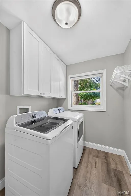 Laundry room off of garage leading into kitchen — 6 Potomac Court, St Charles, MO 63303