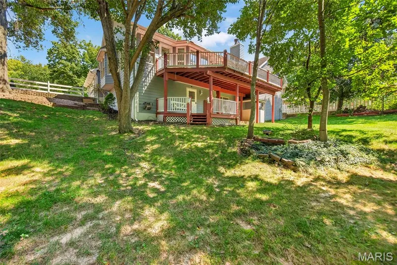Walkout basement walking to a covered deck — 6 Potomac Court, St Charles, MO 63303