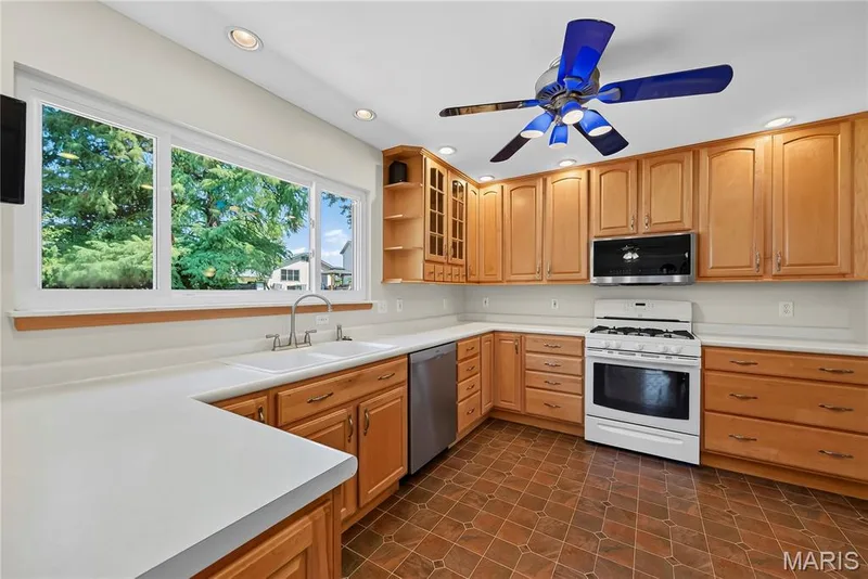 Triple Window in Kitchen overlooking Backyard — 16 Mill Race Drive, St Peters, MO 63376