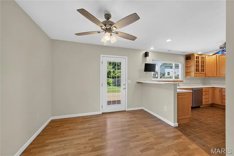 Breakfast Room with Atrium Door to Deck and Backyard — 16 Mill Race Drive, St Peters, MO 63376