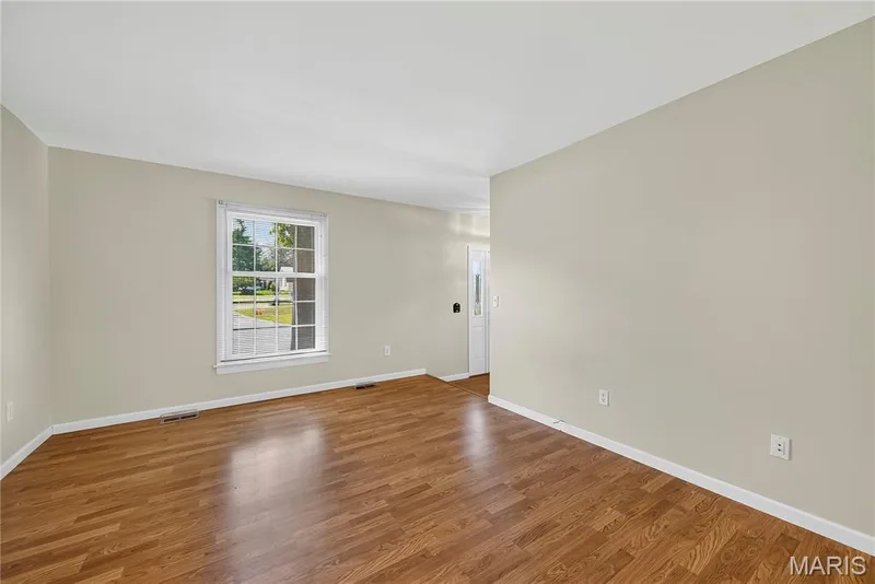 Family Room with Laminate Flooring — 16 Mill Race Drive, St Peters, MO 63376