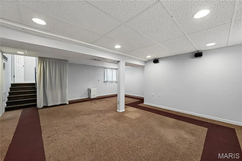 Rec/ Family Room with Closet in Finished Lower Level — 16 Mill Race Drive, St Peters, MO 63376