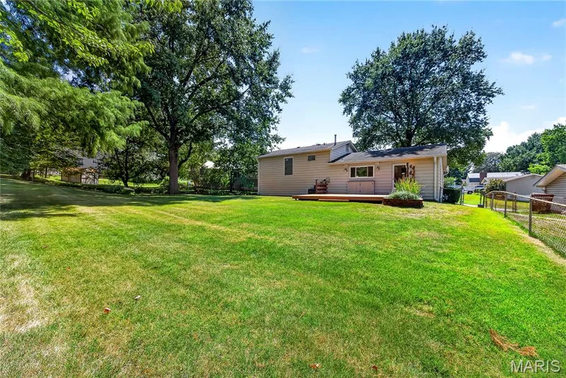 Level Backyard with Mature Trees and some Fencing — 16 Mill Race Drive, St Peters, MO 63376